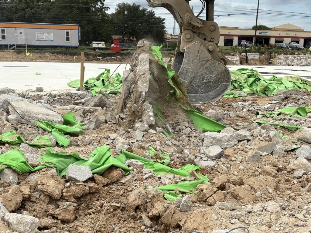 How DeCrowder Demo Successfully Removed a 77,000 Sqft Concrete Slab 4 Excavator Demoliiton